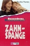 Besonderes Kennzeichen: Zahnspange